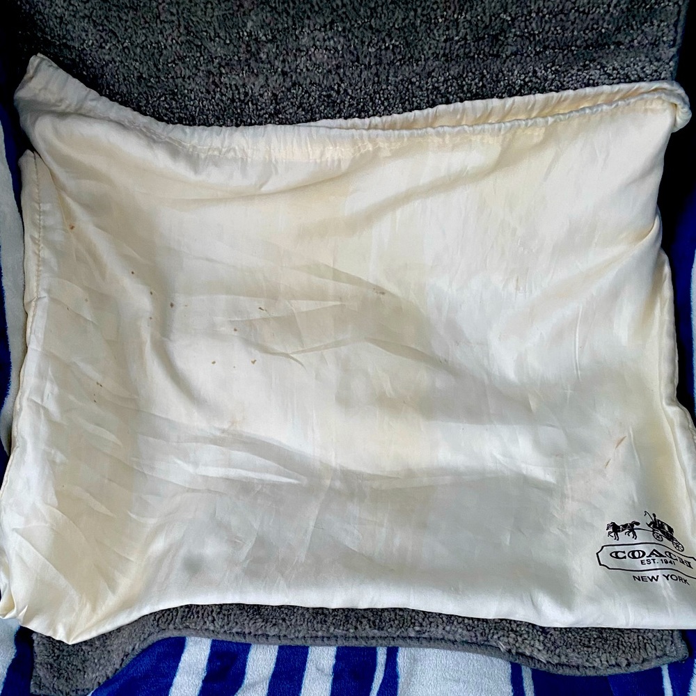 Coach dust bag to put your purse in. I’m willing to bundle this with a purse.